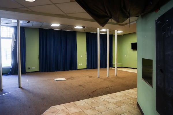 Inside the main floor of 125 Edgewood, which served as the Baptist Student Center at Georgia State University for decades. The large street-level windows have been covered by curtains for years, said the team working on its revival. (Abbey Cutrer/AJC)