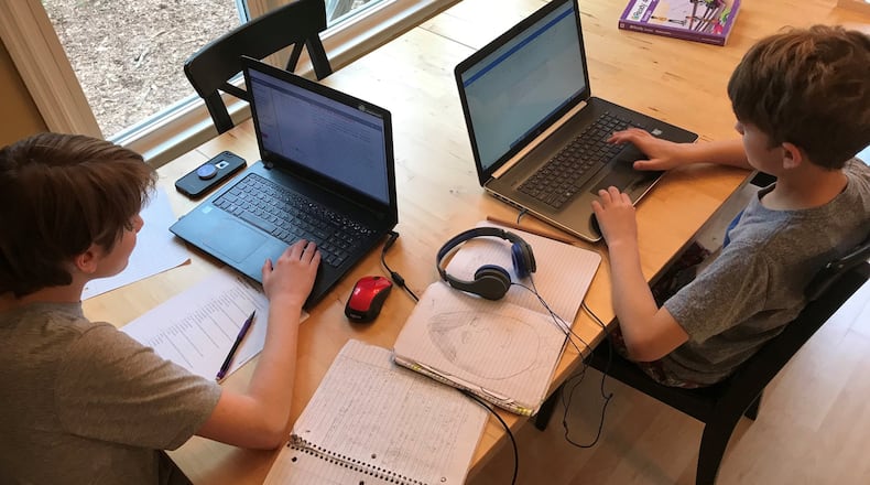 Olga Spivey, a Cherokee County parent, said she thinks her four boys are seeing teachers in a new light as the boys do school work online at home: “With the teachers working from home, the boys see that they have children who are doing school work as well. They have pets and other distractions and are making it work,” she said. “I think it’s great that they connect in a way that they haven’t before.” OLGA SPIVEY