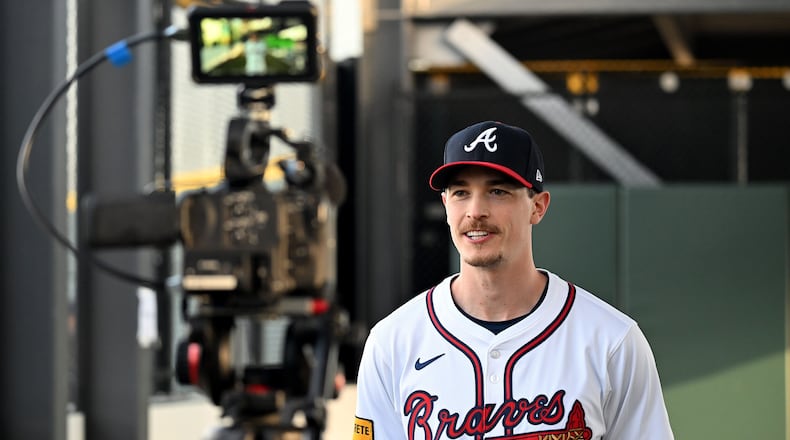 Braves starter Max Fried is interviewed in front of video camera during the team's photo day Feb. 23 in North Port, Florida. (Hyosub Shin / Hyosub.Shin@ajc.com)