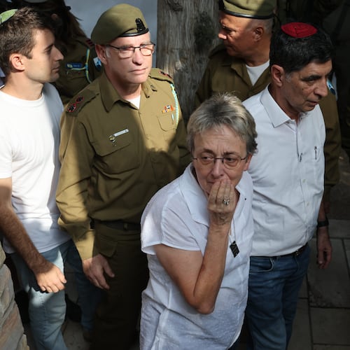Leah and Simcha Goldin, the parents of late Israeli hostage soldier Hadar Goldin, attend his funeral, in Kfar Saba, Israel, Tuesday, Nov. 11, 2025. Goldin was killed in 2014 and his body was returned as part of the current ceasefire deal between Israel and Hamas. (Abir Sultan/Pool Photo via AP)