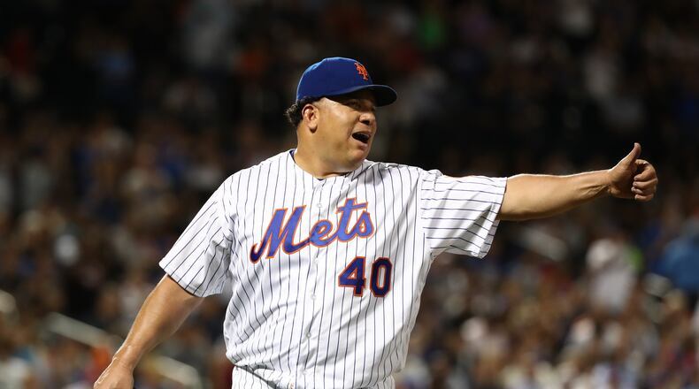 Braves veteran newcomer Bartolo Colon is one of five Atlanta players who’ll be featured on bobblehead dolls in 2017. Colon bobblehead day is a June 9 series opener against his former Mets team. (Photo by Al Bello/Getty Images)