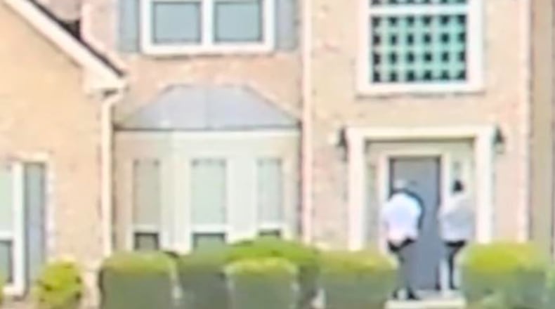 Police continue to search for a suspect wanted in connection with a fatal shooting inside a Rockdale County home this month. The second suspect is in custody.