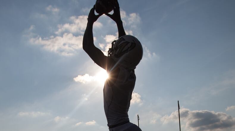 A Whitefield Academy player warms up before a high school football game against Mount Paran Christian, Friday, Aug. 28, 2015, in Kennesaw, Ga. BRANDEN CAMP/SPECIAL