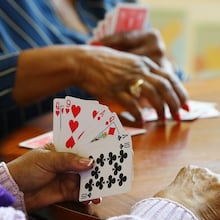 Seniors play cards at the Centerville Senior Center in Snellville. Bridge still demands focus, strategy and steady growth — making it as mentally rewarding today as it has always been. (AJC 2022)