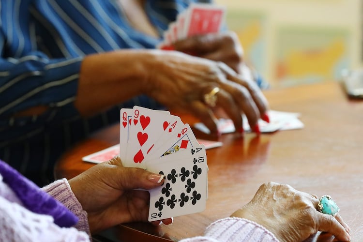Seniors play cards at the Centerville Senior Center in Snellville. Bridge still demands focus, strategy and steady growth — making it as mentally rewarding today as it has always been. (AJC 2022)