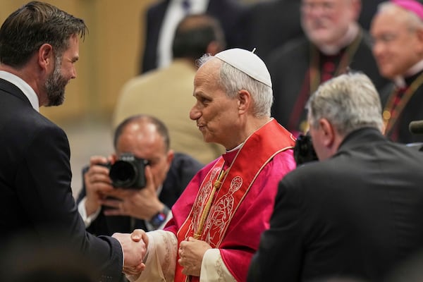 Pope Leo XIV's meets Vice President JD Vance after the formal inauguration of his pontificate in St. Peter's Square, at the Vatoican, Sunday, May 18, 2025. (AP Photo/Alessandra Tarantino)