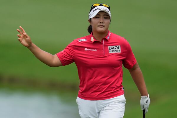 Haeran Ryu, of South Korea, reacts to her putt on the nineth green during the third round of the Chevron Championship LPGA golf tournament Saturday, April 26, 2025, in The Woodlands, Texas. (AP Photo/Ashley Landis)