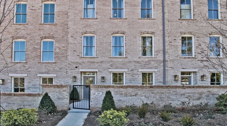 Three-story townhouses at The Park at Historic Roswell offer buyers a low-maintenance lifestyle and the ability to walk to shops, services and restaurants. CONTRIBUTED BY Monte Hewett Homes