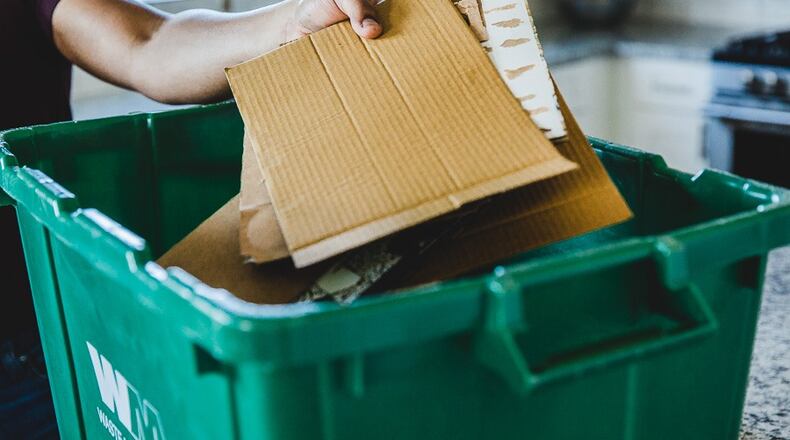 According to Waste Management, break down cardboard boxes before it heads into the bin. "Not only will the broken down box create more space in your container, but this ensures overall efficiency for recycling." Courtesy Waste Management