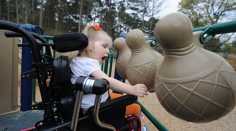 Public spaces such as this playground in Austell offer greater accessibility to people with disabilities. (Photo Credit: Johnny Crawford/AJC)