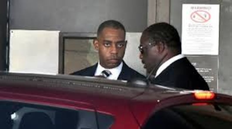 Atlanta’s former chief purchasing officer Adam Smith, left, leaves the federal courthouse in September after pleading guilty to accepting at least $30,000 in bribes. Smith has been ordered to report to a prison in North Carolina at noon April 18, 2018. HYOSUB SHIN / HSHIN@AJC.COM