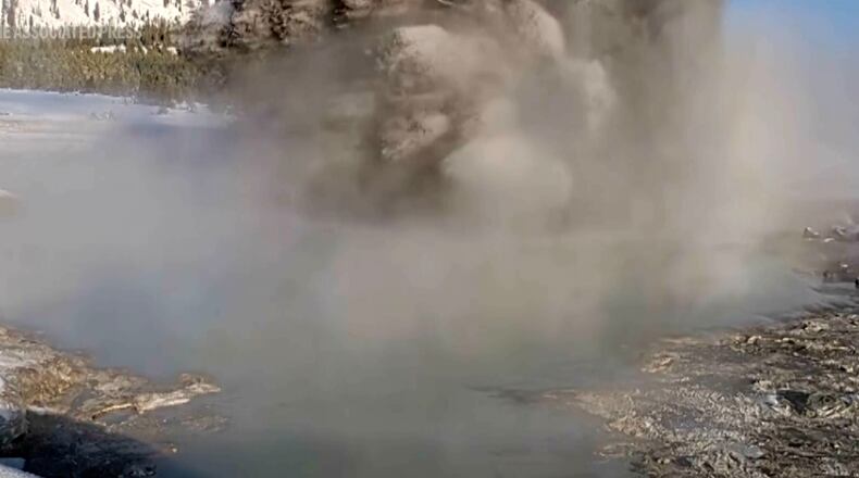 This image made from video provided by the United States Geological Survey (USGS) shows a muddy eruption at Black Diamond Pool in Yellowstone National Park on Saturday, Dec. 20, 2025. (U.S. Geological Survey via AP)