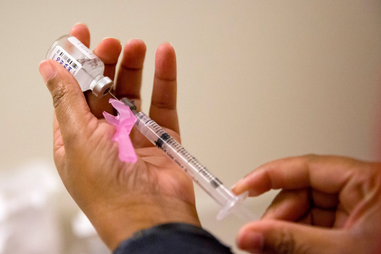 A nurse prepares a flu shot at the Salvation Army in Atlanta. Georgia, like much of the country, is facing a particularly challenging flu season driven by one of this year’s dominant strains. (David Goldman/AP 2018)