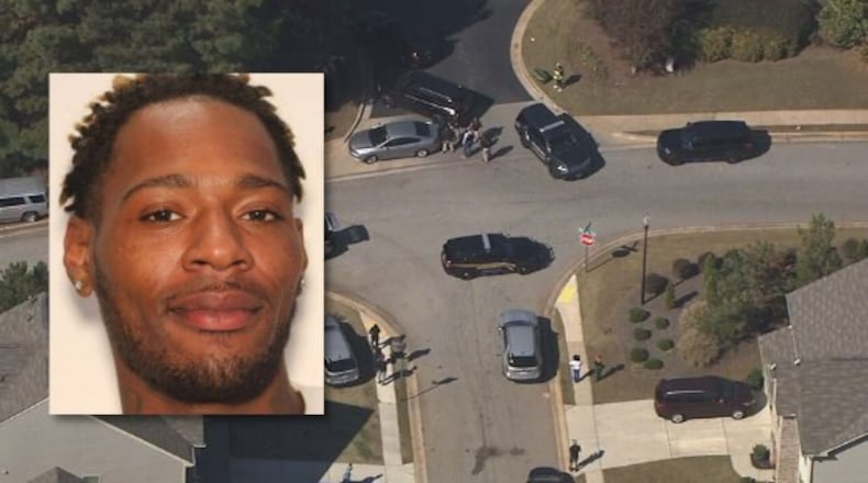 Brentson Bernard Thomas is wanted in a Henry County shooting that injured a detention officer and killed a man, officials said. Two people have been arrested and are accused of helping him evade arrest.