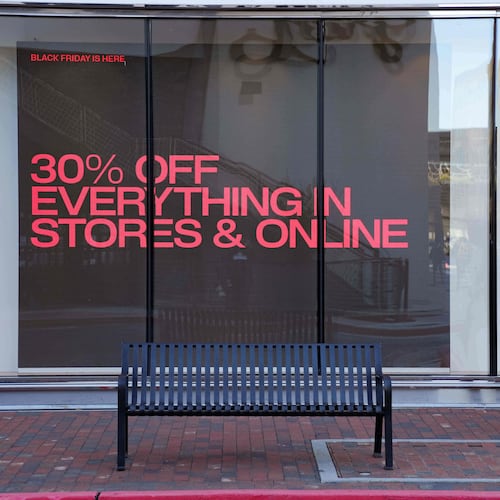 Shoppers browse for Black Friday deals at Atlantic Station outdoor mall, Friday, Nov. 28, 2025, in Atlanta, Ga. (AP Photo/Megan Varner)