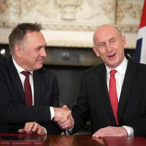 Norway's Minister of Defence Tore O. Sandvik, left, and Britain's Secretary of State for Defence John Healey shake hands during the signing of a Strategic Defence Agreement in Downing Street in London, Thursday, Dec. 4, 2025. (AP Photo/Alastair Grant, pool)