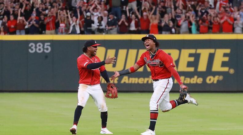 The Braves celebrated when they clinched the NL East Division on Sept. 20. Curtis Compton/ccompton@ajc.com