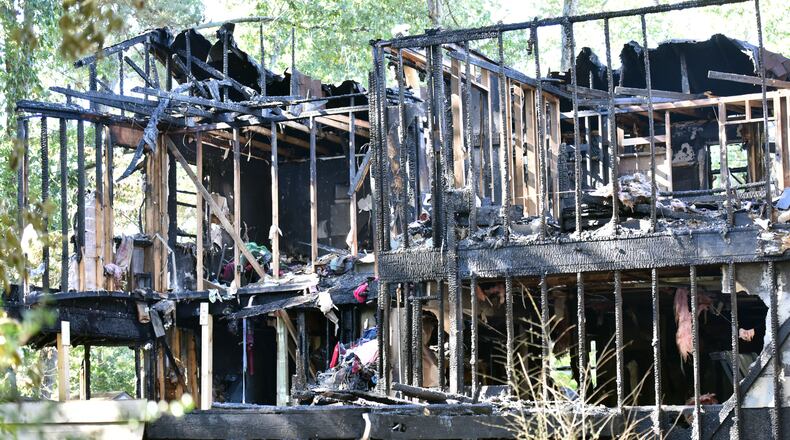 October 23, 2016 Duluth - Five adults were found dead after a fire gutted a home in the 2200 block of Post Oak Drive in unincorporated Duluth early Sunday morning on Sunday, October 23, 2016. Five people are dead after a fire gutted a home in unincorporated Duluth early Sunday morning, Gwinnett County fire officials said. Gwinnett County Department of Fire and Emergency Services Capt. Tommy Rutledge confirmed that five adults were found dead in the home in the 2200 block of Post Oak Drive NW, a two-story structure in the middle of a dead-end street near Old Peachtree Road. HYOSUB SHIN / HSHIN@AJC.COM