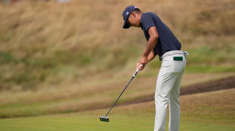 Michael Kim of the United States putts on the 3rd green during the second day of the British Open Golf championships at Royal Birkdale golf club, in Southport, England, Friday, July 17, 2026. (AP Photo/David Goldman)