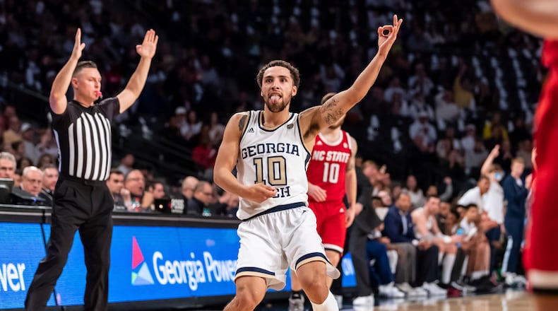 Break out the air guitar, Georgia Tech guard Jose Alvarado enjoys himself against North Carolina State in January. (AP Photo/Danny Karnik)