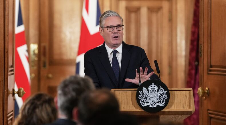 Britain's Prime Minister Keir Starmer attends a press conference to announce government action to protect children online, at Downing Street in central London, Monday, June 15, 2026. (Carlos Jasso/ Pool Photo via AP)