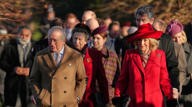 Britain's King Charles III and Queen Camilla arrive to attend the Christmas Day service at St Mary Magdalene Church in Sandringham, Norfolk, England, Thursday, Dec. 25, 2025.(AP Photo/Jon Super)
