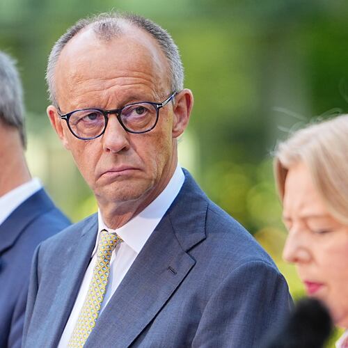 German Federal Chancellor Friedrich Merz, center, attends a press conference with Minister-President of Bavaria and CSU Chairman Markus Söder, left, Federal Minister of Labor and Social Affairs Bärbel Bas, right and Federal Minister of Finance, Lars Klingbeil, in the garden of the Chancellery following the meeting of the coalition committee, in Berlin, Thursday, July 2, 2026. (Michael Kappeler/dpa via AP)