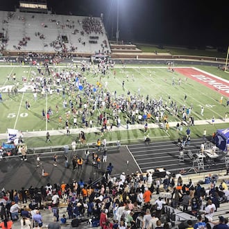 Students empty the stands after Northside of Warner Robins defeats Warner Robins on Sept. 4 to end a nine-game losing streak in the rivalry. (Cody Chaffins/AJC)