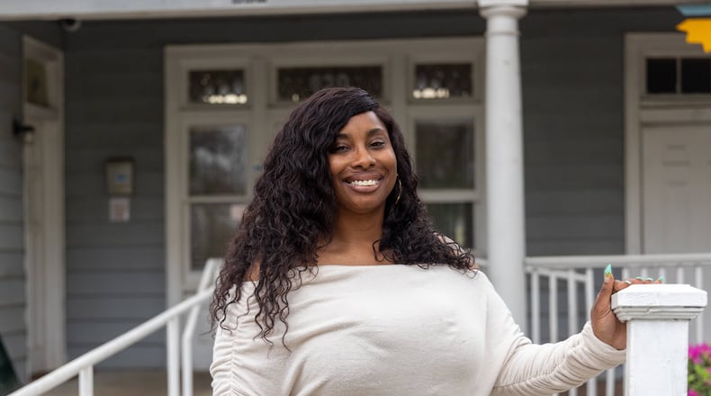 Sharif Robinson left a domestic violence situation four years ago and came to Atlanta to seek refuge at various shelters. Finally, at the Nicholas House she was able to connect with a case manager and find stability. She now works full time as an airport shuttle driver and the family lives in an apartment. She's also saving for financial independence. ({Phil Skinner for the AJC)