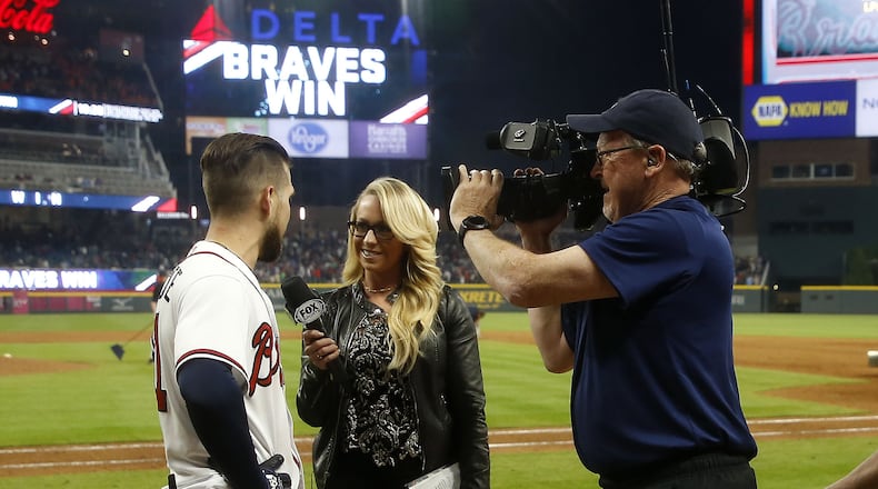Former Fox Sports South Braves reporter Kelsey Wingert interviews former Braves center fielder Ender Inciarte after an April 21, 2018, game at SunTrust Park (now Truist Park). (File photo by Mike Zarrilli)