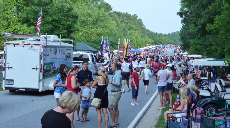 Peachtree City's annual July 4 parade draws hundreds of spectators along the two-mile route. Jill Howard Church For the AJC