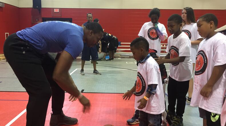 Hawks center Dwight Howard spends time with children as part of his foundation focused on early childhood education and literacy and youth empowerment. Photo provided