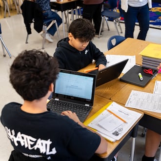 Vickery Mill Elementary School fifth grade students work together during a reading and writing class Thursday, March 5, 2026. (Ben Hendren for the AJC)