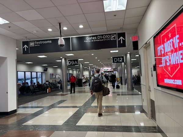 A view of the older gates at Concourse D at Hartsfield-Jackson Atlanta International Airport. The concourse has long been the airport's narrowest. The $1.4 billion project is set to last until 2029, and is expanding a few gates at a time in order to limit airline disruption. (Emma Hurt/AJC)