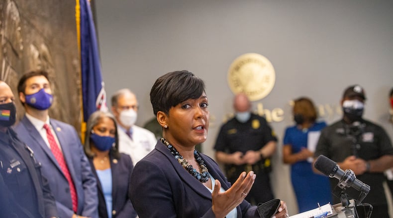 Atlanta Mayor Keisha Lance Bottoms leads a press conference Tuesday, Aug 3, 2021 at City Hall to address a rise in crime, the recent murder in Piedmont Park and covid delta concerns. She is supported by Deputy Chief Charles Hampton, Atlanta Police Chief Rodney Bryant and Emory infectious diseases Dr. Carlos Del Rio to address while addressing city's current issues. (Jenni Girtman for The Atlanta Journal-Constitution)