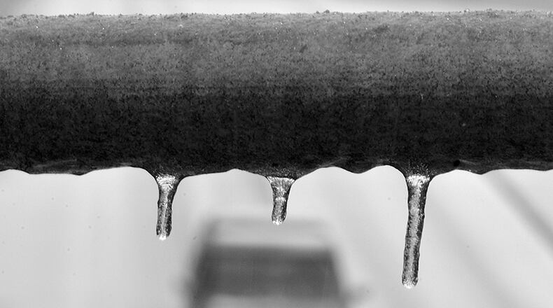 Icing remained an issue across Metro Atlanta Thursday as snowfall was expected throughout the region.