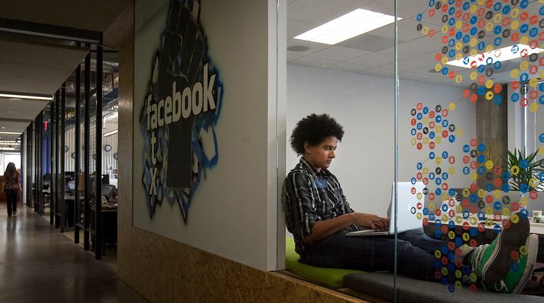 04.19.11 Laura Skelding AMERICAN-STATESMAN  Charlton Gholson, OSO account manager, is photographed in Facebook's Austin offices on Tuesday, April 19th, 2011. For a business feature on Facebook, which has been in Austin for a year now. tia_2012