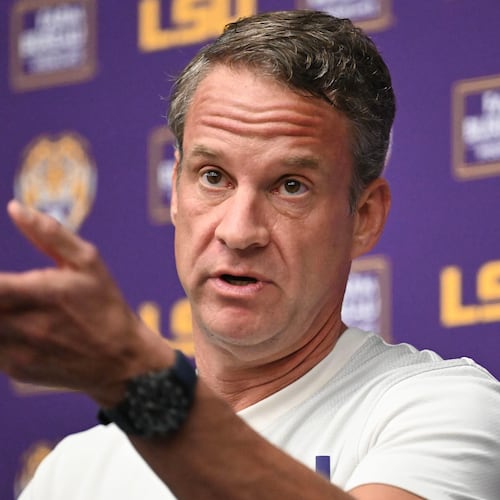 FILE - LSU football head coach Lane Kiffin speaks during a news conference at the LSU Football Operations Facility in Baton Rouge, La., Feb. 4, 2026. (Hilary Scheinuk/The Advocate via AP, File)