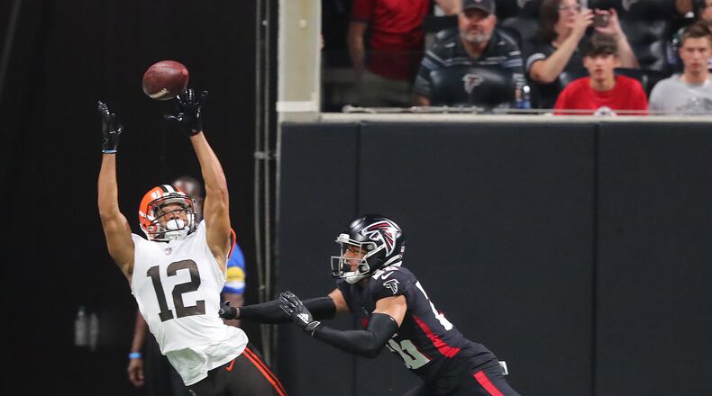 Falcons cornerback Isaiah Oliver breaks up a pass to Cleveland Browns wide receiver KhaDarel Hodge during the first quarter of the final exhibition game of the preseason Sunday, Aug. 29, 2021, at Mercedes-Benz Stadium in Atlanta. (Curtis Compton / Curtis.Compton@ajc.com)