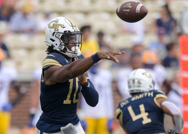 Yellow Jacket quarterback Jeff Sims completes a pass in the second half of play during a NCAA college football game Saturday, Oct. 2, 2021 at Bobby Dodd Stadium in Atlanta. (Daniel Varnado/For the AJC)