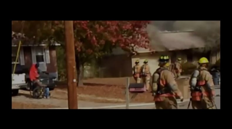 Wheelchair-bound Leon Young (left) was left in a burning house on Ray Street in Riverdale on Sunday. (Credit: Channel 2 Action News)
