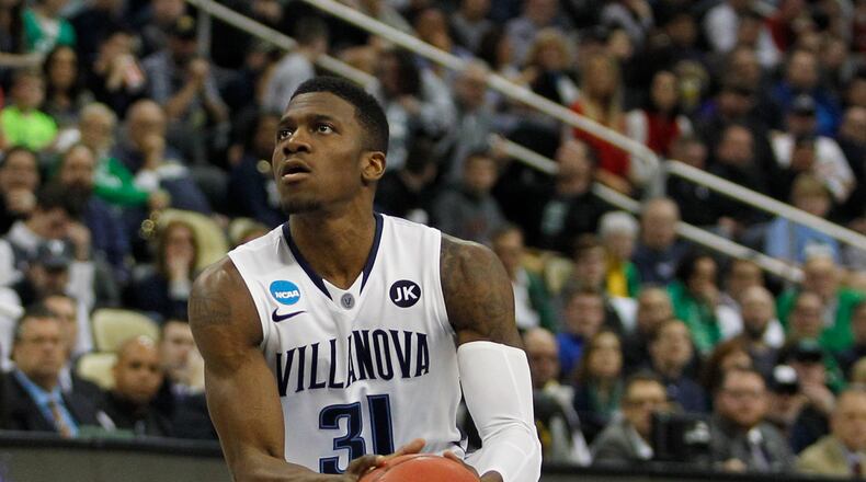 PITTSBURGH, PA - MARCH 21: Dylan Ennis #31 of the Villanova Wildcats plays against the North Carolina State Wolfpack during the third round of the 2015 NCAA Men's Basketball Tournament at Consol Energy Center on March 21, 2015 in Pittsburgh, Pennsylvania. (Photo by Justin K. Aller/Getty Images) Villanova guard Dylan Ennis will be eligible to transfer and play immediately following his graduation from Villanova in May. (GETTY IMAGES)