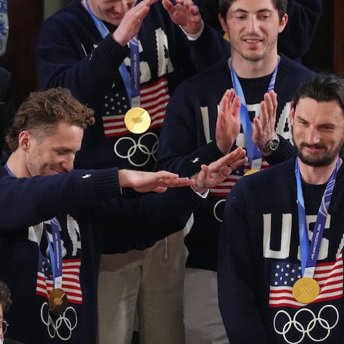 Members of the United States' hockey team attend as President Donald Trump delivers the State of the Union address to a joint session of Congress in the House chamber at the U.S. Capitol in Washington, Tuesday, Feb. 24, 2026. (AP Photo/Matt Rourke)