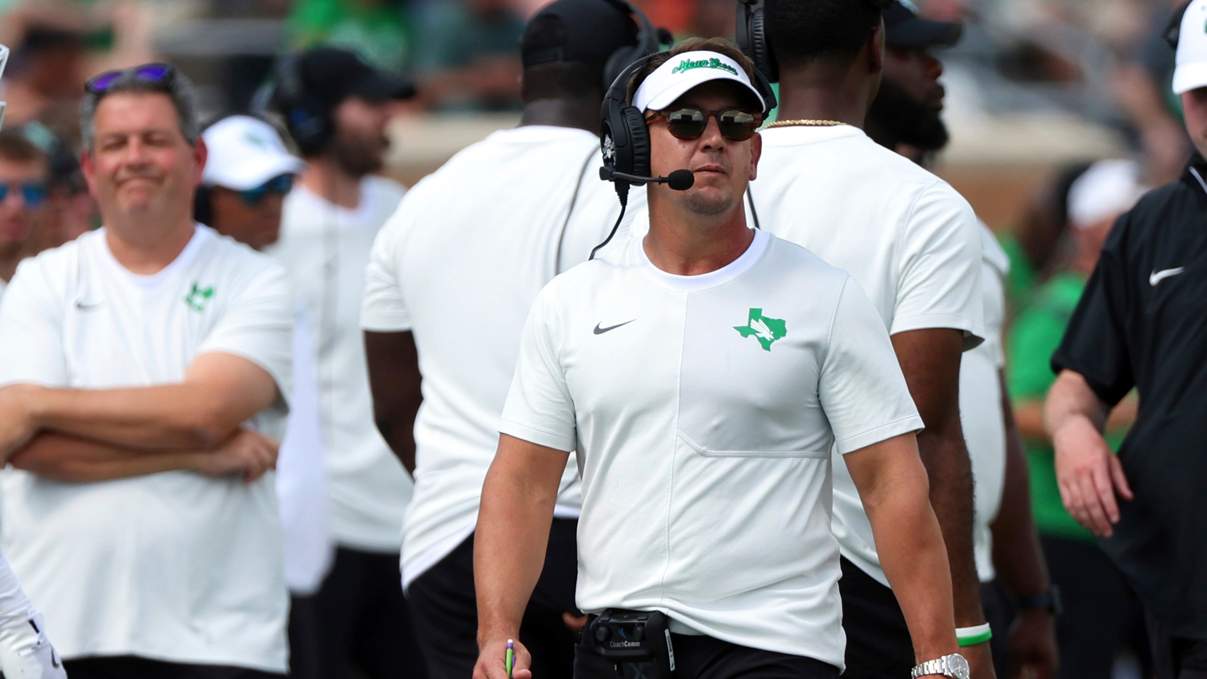 FILE - North Texas head coach Eric Morris walks the sideline during an NCAA college football game against Washington State, Sept. 13, 2025, in Denton, Texas. (AP Photo/Richard W. Rodriguez, file)
