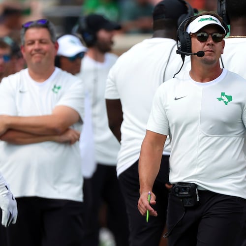 FILE - North Texas head coach Eric Morris walks the sideline during an NCAA college football game against Washington State, Sept. 13, 2025, in Denton, Texas. (AP Photo/Richard W. Rodriguez, file)