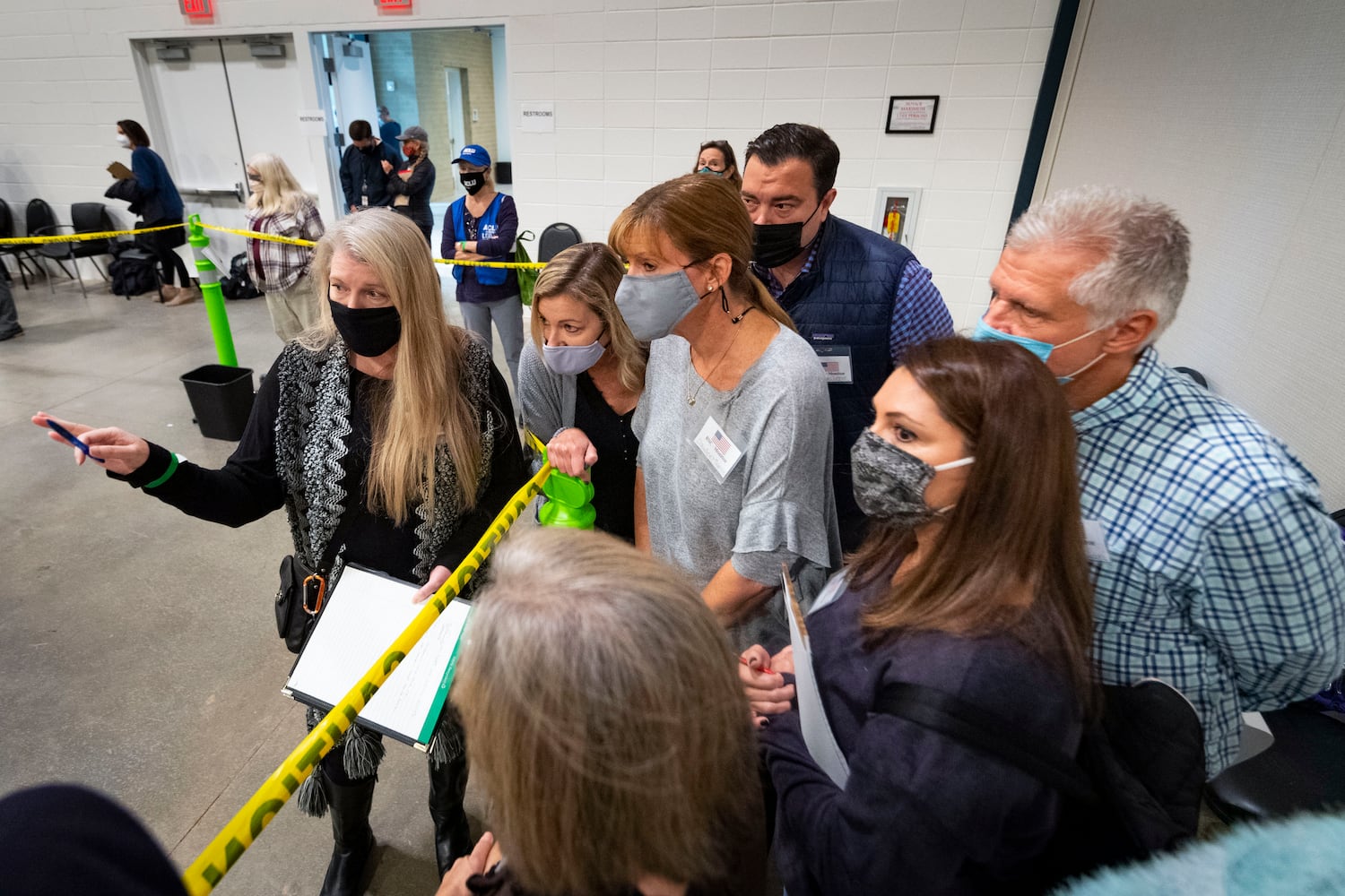 A monitor explains procedure to Republican observers during a Cobb County hand recount of Presidential votes on Sunday, Nov.15, 2020, at the Miller Park Event Center in Marietta. (JOHN AMIS FOR THE ATLANTA JOURNAL-CONSTITUTION)