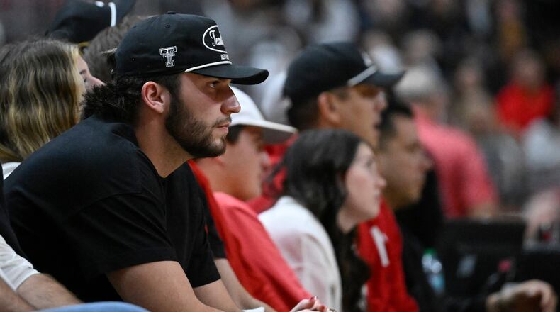 FILE - Texas Tech quarterback Brendan Sorsby watches the second half of an NCAA college basketball game between Texas Tech and Cincinnati, Feb. 24, 2026, in Lubbock, Texas. (AP Photo/Justin Rex, file)