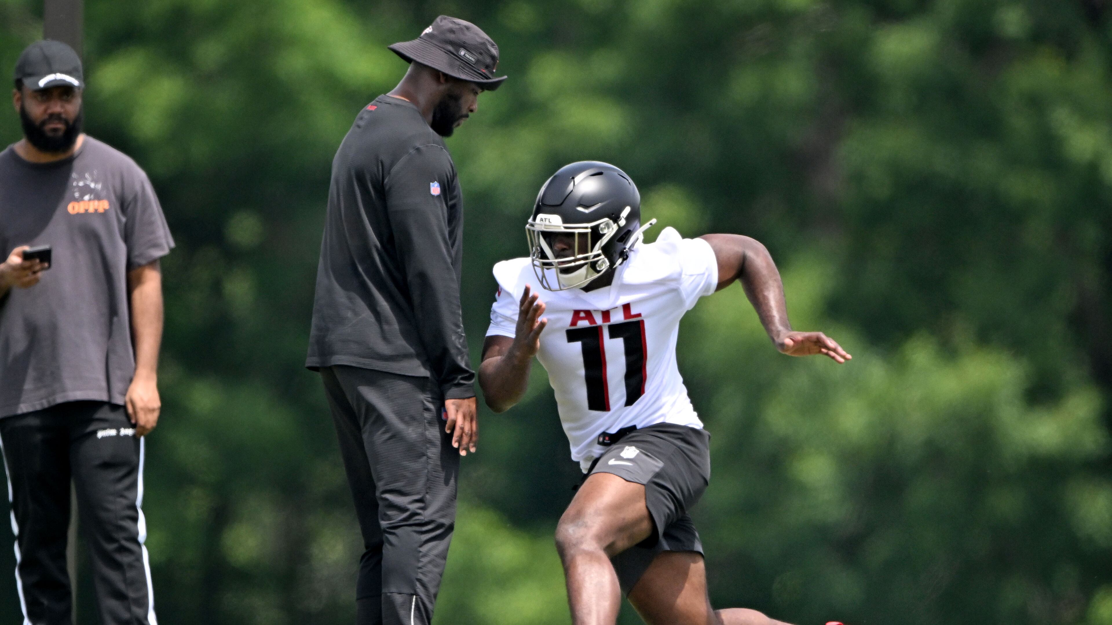 Atlanta Falcons edge rusher Jalon Walker runs a drill during the Atlanta Falcons Rookie Minicamp at the Atlanta Falcons Training Camp, Friday, May 9, 2025, in Flowery Branch. (Hyosub Shin/AJC)