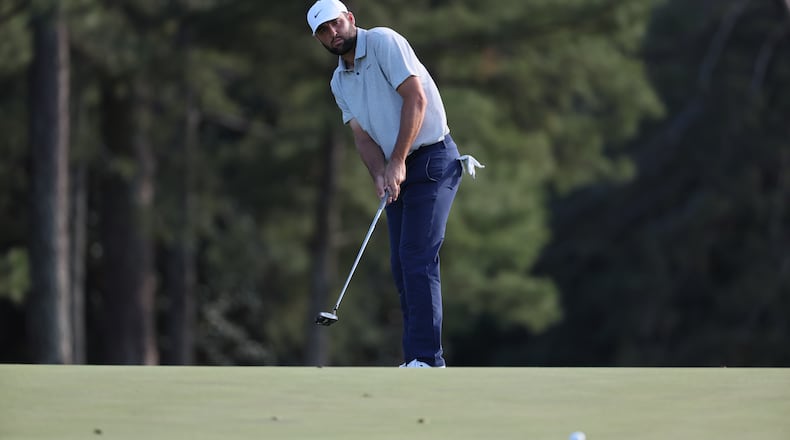 Scottie Scheffler hits on 18th hole at the 2024 Masters Tournament at Augusta National Golf Club, Thursday, April 11, 2024, in Augusta, Ga. Jason Getz / Jason.Getz@ajc.com)