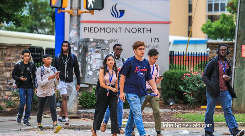 Students return to Georgia State University in downtown Atlanta. The university has the largest enrollment of any institution in the state. AJC FILE PHOTO.